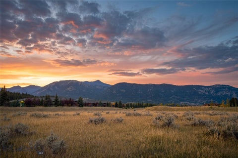 Photo of TBD Ousel Falls Road, Big Sky, MT 59716 (MLS # 415387)