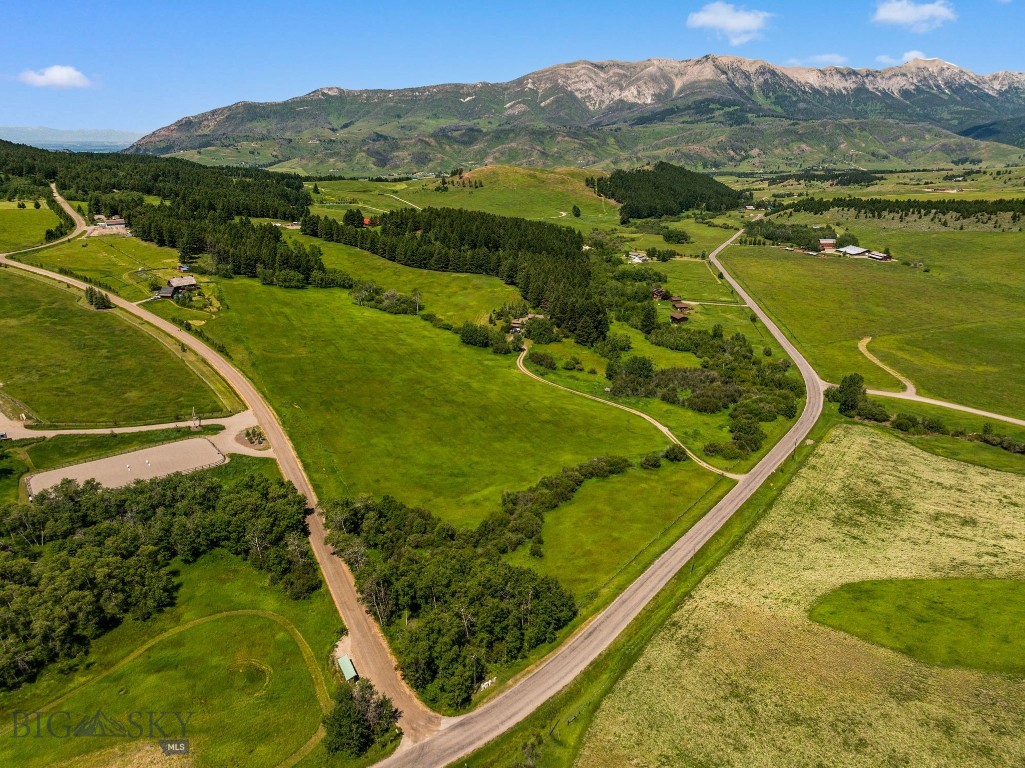 Come build your dream home! Discover your own slice of paradise in the highly sought after Jackson Creek area in the Bridger Canyon! This property has not been on the market since 1978. 20+ acres of breathtaking meadows, rolling grasslands and mature trees, this mountain property offers the perfect blend of natural beauty and tranquility. With two seasonal springs meandering through the property, you'll experience a serene connection to nature right outside your door. Wildlife enthusiasts will be delighted by the frequent visits from deer, elk, sandhill cranes and other local animals. The picturesque mountain views, (to include the Bridger Range), serve as a stunning backdrop, while vibrant wildflowers add a touch of color to the landscape. Imagine your dream home, starting your day with a cup of coffee on your private deck, taking in nature while watching the sun rise over your own peaceful haven. This property is a rare gem that offers endless possibilities. There is already an approved build site identified. Only 20 minutes to downtown Bozeman and 15 minutes to Bridger Bowl Ski Area, this property is surrounded by trails for hiking, biking and hunting. Don't miss this chance to make this extraordinary retreat your own! Video includes images of adjacent property.