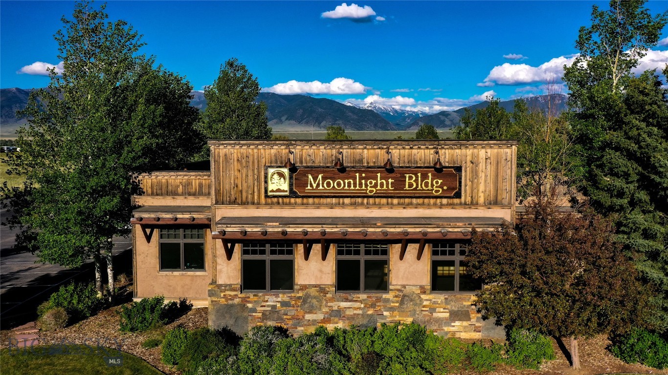 Moonlight Building – Trophy-Class Commercial Investment. Seize the rare opportunity to own the Moonlight Building, a trophy-class commercial asset in the heart of Ennis, Montana — one of the most picturesque and thriving destinations in the Rocky Mountain West. Strategically situated at 2 Hot Springs Loop, this iconic property offers unparalleled visibility, accessibility, and investment potential.
Prime Location: Situated just minutes from downtown Ennis, a gateway to Yellowstone National Park and renowned for world-class fly fishing on the Madison River, the Moonlight Building attracts steady year-round traffic from tourists and locals alike.
Trophy-Class Asset: Built to the highest standards with premium materials and architectural flair, this standout building is ideal for upscale retail, dining, office, or mixed-use purposes.
Flexible Investment: The property features an additional lot, offering potential for expansion or added development value — ideal for future phases, outdoor amenities, or complementary businesses.
Strong Growth Market: Ennis is experiencing a boom in tourism, real estate, and small business development, making this a strategic investment in a high-demand, low-inventory area.
Whether you're an investor seeking stable income with appreciation upside or an entrepreneur looking for a flagship location in Montana’s Big Sky Country, the Moonlight Building delivers rare scale, quality, and future potential.
Inquire today to schedule a private tour or request the investment package. Opportunities of this caliber in Madison County don't last.