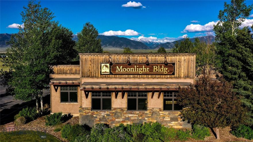 Moonlight Building – Trophy-Class Commercial Investment. Seize the rare opportunity to own the Moonlight Building, a trophy-class commercial asset in the heart of Ennis, Montana — one of the most picturesque and thriving destinations in the Rocky Mountain West. Strategically situated at 2 Hot Springs Loop, this iconic property offers unparalleled visibility, accessibility, and investment potential.

Prime Location: Situated just minutes from downtown Ennis, a gateway to Yellowstone National Park and renowned for world-class fly fishing on the Madison River, the Moonlight Building attracts steady year-round traffic from tourists and locals alike.

Trophy-Class Asset: Built to the highest standards with premium materials and architectural flair, this standout building is ideal for upscale retail, dining, office, or mixed-use purposes.

Flexible Investment: The property features an additional lot, offering potential for expansion or added development value — ideal for future phases, outdoor amenities, or complementary businesses.

Strong Growth Market: Ennis is experiencing a boom in tourism, real estate, and small business development, making this a strategic investment in a high-demand, low-inventory area.

Whether you're an investor seeking stable income with appreciation upside or an entrepreneur looking for a flagship location in Montana’s Big Sky Country, the Moonlight Building delivers rare scale, quality, and future potential.

Inquire today to schedule a private tour or request the investment package. Opportunities of this caliber in Madison County don't last.