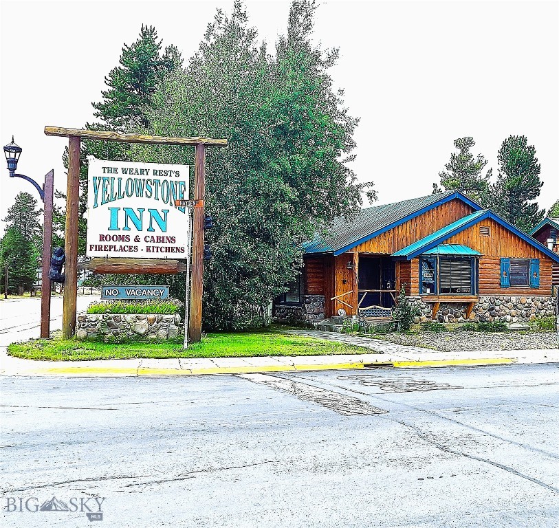 Charm for days. A remarkable opportunity to own a beautiful and meticulously maintained property. This 10-unit motel consists of 5 units up front then 5 individual cabin units on the back side. There are 5 kitchenette units and 5 units with fireplaces. The property also has a 2000 sq ft home that houses the motel office and can serve as owners/managers quarters A prime location just a few blocks drive to the West Entrance of Yellowstone National Park. Conveniently located on highway 20, which leads through town. Offering lodging with individuality and character that combines the rugged feel of Yellowstone with modern day conveniences. The units have been extremely well maintained with updated flooring and tile work in all the bathrooms. Only minutes away from all of the stores, outfitters and fly shops in West Yellowstone. With significant return business and the authentic feel of the units, this property rarely has vacancies. Currently the property operates from Mid-May to the 1st of October only. The property is sold inclusive of all furniture, appliances, and fixtures. A turnkey business ready for the new owner to add their unique touch and welcome guests.