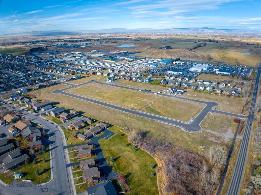 New single-family subdivision lots ready to build. Woodbury Grove Subdivision combines the beauty of Montana's rural landscape with the convenience of living just minutes from everything Bozeman has to offer. This subdivision offers wide streets and sidewalks creating a neighborhood feel rarely found outside Bozeman city limits. A Master Plan designed to create multiple living options from single family homes to townhouse lots and a few condo units will create an intimate community for every home as the development grows. Traditional architecture, responsible design, quiet streets, and more make Woodbury Grove perfect for families with children to build a community together over time. Located on the west side of Bozeman, 10 minutes from downtown to the Gallatin River.