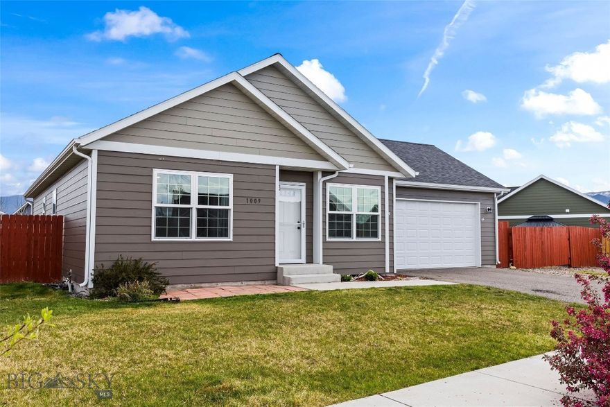 Experience elevated Montana living in Belgrade’s desirable Meadowlark Ranch community. This beautifully maintained single-level home offers 3 bedrooms, 2 full bathrooms, and an open-concept layout designed for comfortable everyday living. Vaulted ceilings and abundant natural light create a warm, modern feel throughout the main living spaces.

The stylish kitchen features dark cabinetry, stainless steel appliances, ample counter space, recessed lighting, and a breakfast bar ideal for casual dining and entertaining. The spacious primary suite includes a private ensuite bath and generous closet space, while two additional bedrooms offer flexibility for guests, a home office, or fitness space.

Outside, enjoy a fully fenced backyard with room to relax, garden, or entertain, plus an attached 2-car garage and additional parking. Conveniently located near Belgrade amenities and just a short drive to Bozeman, this move-in-ready home combines modern comfort, functionality, and Montana lifestyle appeal.