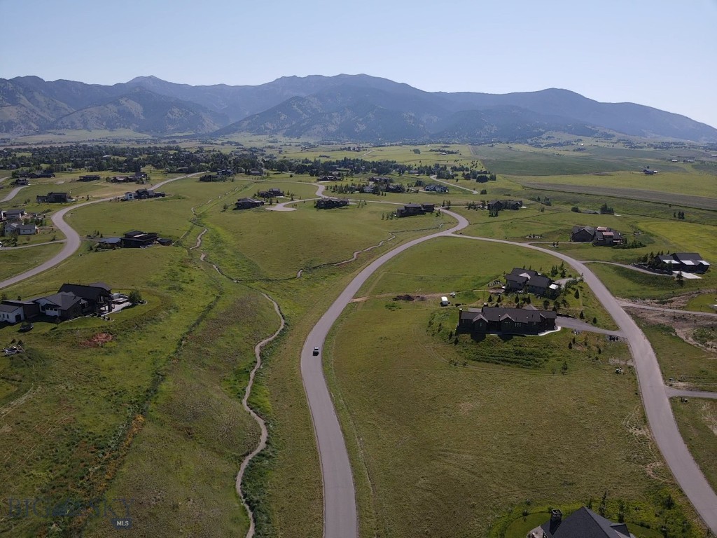 This Springhill Reserve lot nestled in the foothills of the Bridger Mountain Range is the perfect place to build your dream home! Extensive views of the Gallatin Valley including the Spanish Peaks, Hyalite, and Tobacco Root Ranges to the South and West and at your back, to the east, the towering Bridgers' Less than ten minutes to the airport and downtown Bozeman. Springhill Reserve provides an elaborate trail system throughout and is also just minutes from several recreational opportunities including hiking trails, fishing access on the East Gallatin, and 2 golf courses. These lots don't come up at this price often so don't hesitate. Call your realtor today!