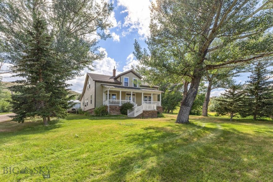 Nestled in a quiet valley, this residence feels like a place where time moves a little slower. As you approach, the covered porch creates a welcoming first impression, offering a peaceful spot to take in the surroundings. Inside, the home reveals a blend of classic character and thoughtful updates. Refinished original details celebrate its craftsmanship, while tall ceilings and generous rooms create an open and comfortable flow. The large lot feels like its own retreat with mature trees, cared-for landscaping, and a garden area ready for new seasons of growth. With Red Lodge only a short drive away, the home offers a balance between calm living and nearby amenities. Info deemed reliable but not guaranteed. Buyer/buyer agent to verify.