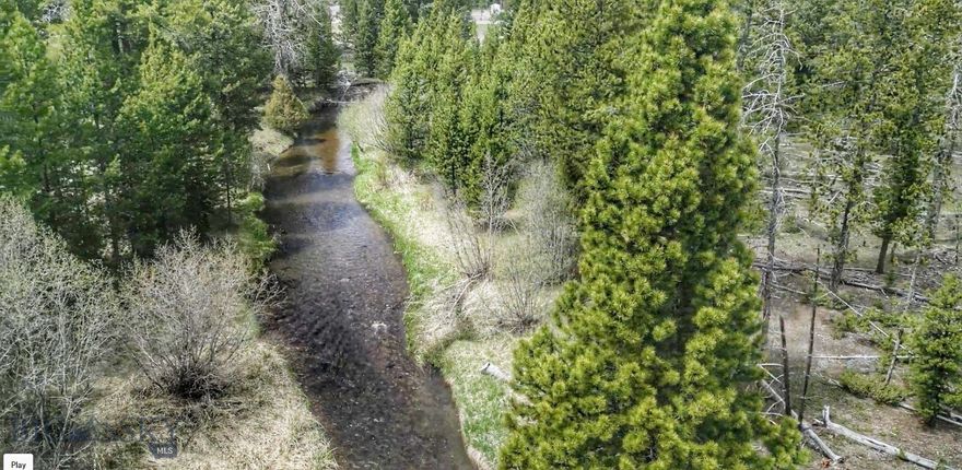 Residential Opportunity on 46 +/-Acres with Alice Creek Frontage, Year Round Plowed Access, Telephone and High Speed Fiberoptic Internet available from property boundary, plus water rights for horses (see associated docs). Welcome to this 46 +/- acre parcel nestled in the heart of Montana’s scenic beauty. This exceptional property offers creek frontage, natural wetlands, a blend of trees, and open spaces. It balances natural charm and convenience—ideally suited for building a home or creating a peaceful retreat. Alice Creek meanders through the property year round, enhancing the serene atmosphere, while open meadows, mature trees, and natural wetlands provide a rich, picturesque landscape. Located at the corner of Highways 200 and 279, the property enjoys easy, year-round access. The land is mostly flat and power is to the property.