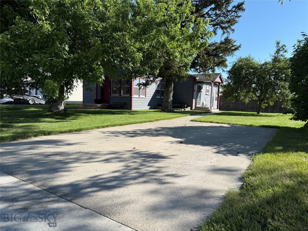 Discover this beautifully updated 3-bedroom, 1-bathroom home that seamlessly blends modern amenities with timeless charm. The interior boasts contemporary finishes, while the exterior showcases meticulous updates, ensuring a move-in-ready experience. Step outside to a serene backyard oasis, featuring mature trees that provide ample shade and a sense of tranquility. Green thumbs will appreciate the raised bed garden, perfect for cultivating fresh produce or vibrant flowers. The deck offers an ideal space for entertaining or relaxing, all within the privacy of a partially fenced yard. Car enthusiasts and hobbyists will be thrilled with the 2-car garage, complete with an additional workshop area—ideal for projects, storage, or creative endeavors. Located in a friendly neighborhood with easy access to local amenities, this home combines comfort, functionality, and outdoor beauty. Don't miss the opportunity to make this exceptional property your own.