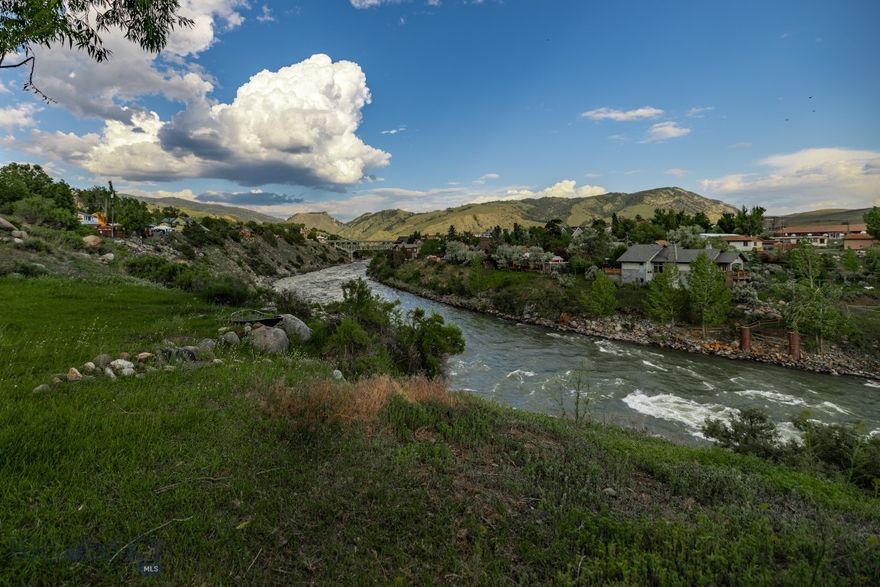 Discover an exceptional investment opportunity just steps from Yellowstone’s north entrance. Located less than five minutes from the park and a short walk from historic Main Street, this property offers breathtaking views and unmatched versatility.

Unrestricted by zoning, you have the freedom to bring your vision to life—whether that means building your dream home, establishing a boutique hotel, creating vacation rentals, or opening a restaurant or retail space. The property comprises four parcels bordering the Yellowstone River and includes 11 fully serviced RV sites. Additionally, the larger lot features a single-family home that has consistently generated income.

The residence is an eco-friendly green modular home—a two-bedroom, two-bath retreat powered by solar energy that has proven popular on Airbnb. Enjoy spectacular views of the Yellowstone River, the iconic Gardiner bridge, and the historic Roosevelt Arch, all while relaxing in a hot tub in a beautifully landscaped backyard.

Gardiner’s unique charm, coupled with its year-round open north entrance to Yellowstone National Park, attracts visitors throughout every season including winter adventurers and wildlife enthusiasts heading to Lamar Valley and Cooke City.

This property is a rare chance to invest in a slice of paradise where opportunity meets nature. To truly appreciate its beauty and potential, you must see it in person—photos simply can’t capture the full experience. Contact the listing agents today to schedule your tour and discover the endless possibilities awaiting you in this remarkable location.