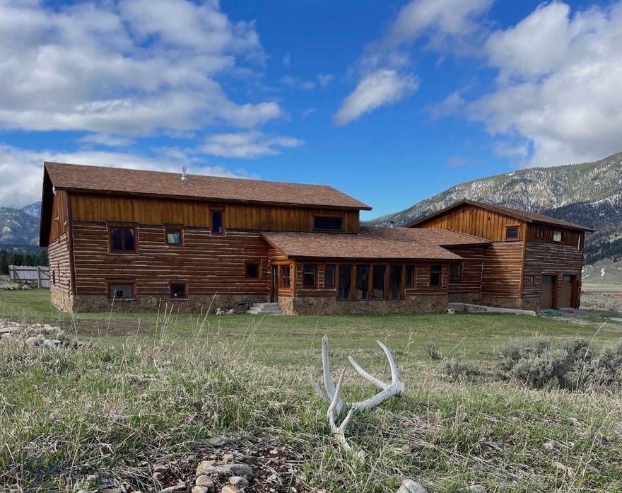 Nestled on a sprawling 3.5+/- acre parcel of land just south of Big Sky and near the school, this exceptional property presents a rare opportunity to customize and complete your dream mountain home. Surrounded by nature's beauty, this property promises serenity and privacy, making it ideal for those seeking a retreat from the hustle and bustle of life. Convenient proximity to the Porcupine & Lower Buck Ridge trailheads and the world-renowned Gallatin River. With an expansive footprint of 5,804+/- square feet, this home offers limitless potential for the discerning buyer seeking to create a personalized sanctuary amidst tranquil surroundings. This property affords ample space to enjoy the outdoors, the ability to add custom landscaping or potential future expansions of the home. Motivated seller!