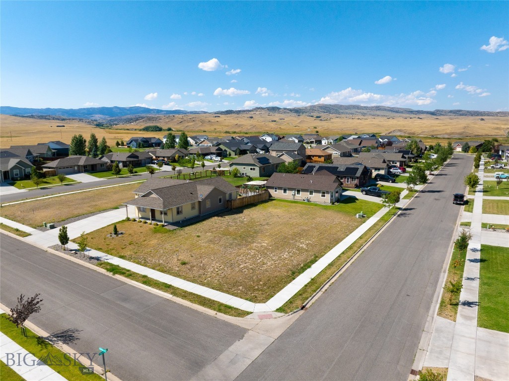 Vacant building lot in Discovery Vista. 8,270 square foot corner parcel with views, views. The curbs and sidewalks are already installed. Park Electric co-op electricity and Notherwestern Energy natural gas lines are to the lot. Livingston City water and sewer lines are also to the site. Livingston is famous for it's dynamic mountain views and they are on display from this 8270 square foot lot. This parcel is in Phase 1 of the Discovery Vista and allows you flexibility in you home design as you can orientate using either Ordway or Meriwether Dr. East as the front of your home-you pick! Discovery Vista has trails and a private park, an active HOA with due of $175 yearly. Covenants are light, the lot is for single family build only, any RV's are to be shielded behind fencing. One of the few lots left in Phase 1, this one is a gem. Area amenities which are nearby include City of Livingston's trail system, soccer park, baseball park and a wildlife preserve. Amenities to the Livingston area are the charming downtown of Livingston and its festivals, farmer's markets, great dining, art galleries, fishing, hiking, biking, skiing and 50 miles from Yellowstone National Park. Bozeman International airport is approximately 45 minutes drive through some of the prettiest country imaginable.