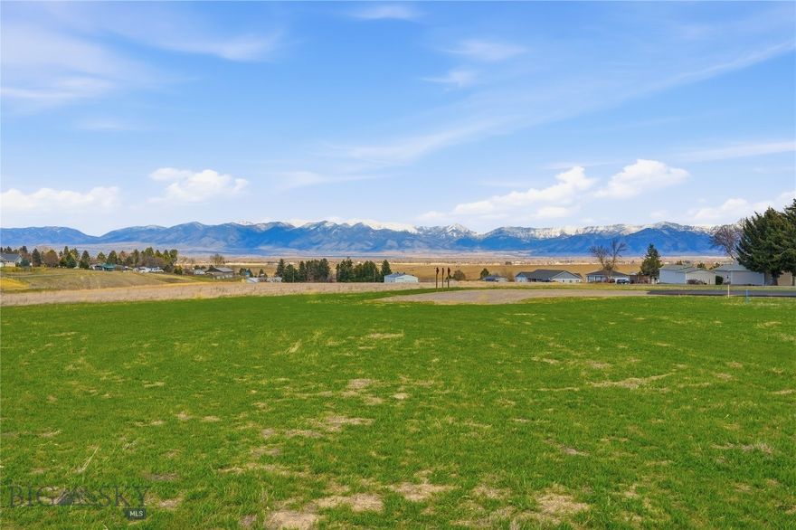 Just what you’ve been looking for, over an acre with minimal covenants and breathtaking mountain views! 1.02 acre parcel in coveted Churchill that's part of a new minor subdivision.  Dreaming of building a barndominium or shop? Planning to live in your RV during construction? (Permitted up to 12 months.) Considering a short-term rental? This lot offers the flexibility you need. You can even raise chickens or 4-H animals. At the same time, values and neighborhood aesthetics are protected through a Design Review Committee, ensuring every home and outbuilding contributes to a cohesive and attractive community. Easy to build homesite with level terrain and great usability. The building envelope, septic location, and well site have already been approved and designated by the county. Electric and gas are to the lot. Buyers will be responsible for installing the well and septic. Located in coveted Amsterdam School (K-6) and Manhattan High School District. Don't miss this rare opportunity to own land in Churchill with freedom, views, and convenience.