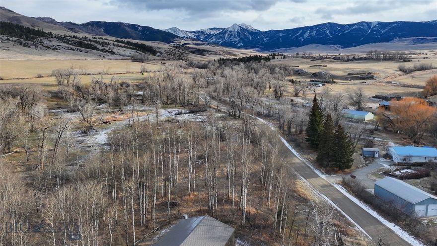 Nestled on one acre along East Boulder Road in McLeod, Montana, this beautiful property is covered with mature aspen trees and offers varying terrain that adds both character and privacy. Abundant wildlife frequents the area, and the East Boulder River is just steps away, providing easy access to world-class fishing and outdoor recreation. With extensive USFS, BLM, and State lands only a short drive away, the opportunities for hiking, hunting, and exploring the Boulder Valleys are endless. Located just 1.2 miles from the Boulder River and 21 miles from Big Timber, this property is an ideal setting to create a private base camp for adventure or establish a peaceful permanent residence surrounded by Montana’s natural beauty.