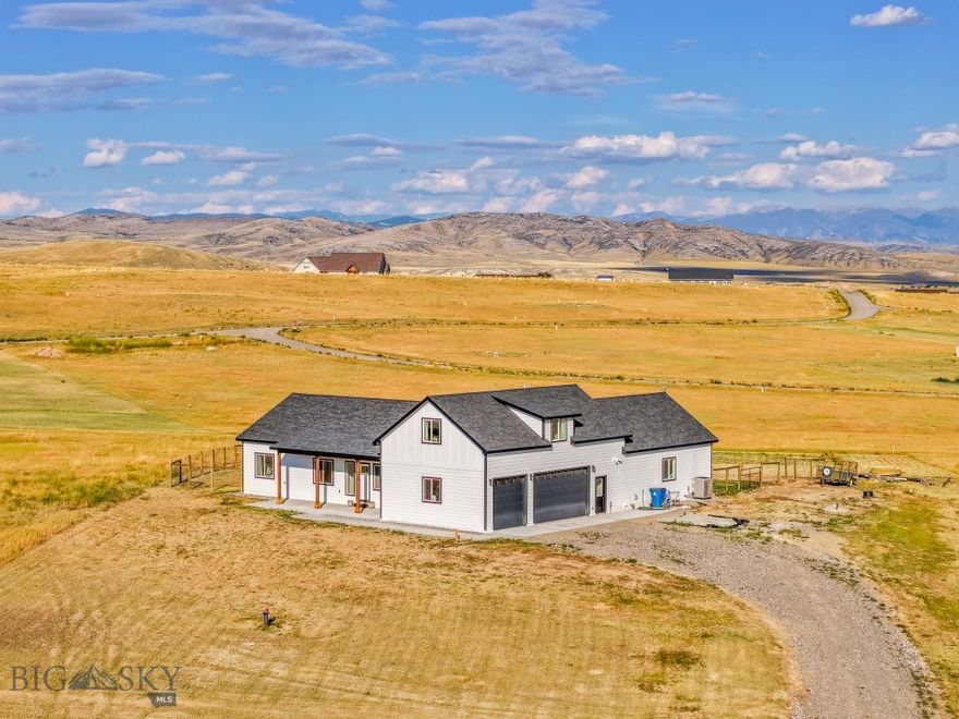 Enjoy breathtaking mountain views and the peaceful charm of country living at this beautifully designed home in Three Forks, MT. Conveniently located just minutes from Interstate 90, this home offers easy access to all that Southwest Montana has to offer. Set on a spacious lot in a quiet neighborhood, the property provides both functionality and comfort throughout.

The main level features an open-concept layout with a bright and modern kitchen that includes granite countertops, vibrant accents, and ample workspace. A private dining room offers separation for more formal meals or gatherings. The larger primary suite includes generous space and thoughtful finishes, accompanied by three additional bedrooms, a full bathroom, a half bathroom, and a large laundry room.

Upstairs, a flexible bonus area includes a living space, full bathroom, and a large non-conforming bedroom—ideal for guests, a home office, or additional living needs.

Outside, the sodded backyard is equipped with underground sprinklers and a designated RV hook-up site with 50-amp service. The property is designed for easy maintenance and versatility. 

Energy-efficient features include:
- 400-amp electrical service
- Constant hot water heater
- Spray foam insulation
- Heat pump for A/C and heating (multi-zoned system)
- Whole-home water filtration system

Whether you're looking for a primary residence or a place with room to grow, this home offers solid construction, efficient systems, and scenic surroundings in a location that's easily accessible to nearby towns and services. Schedule your private showing today!