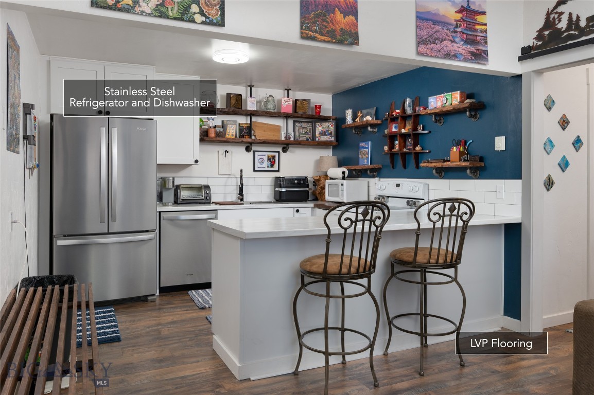 Discover small-town charm in the heart of Manhattan, MT! This beautifully remodeled 1-bedroom, 1-bath condo is perfectly located right on historic Main Street. With quick access to the highway you're only 24 minutes from downtown Bozeman.
Inside, you’ll love the fresh updates, including LVP flooring, soft-closing drawers, and stainless steel refrigerator and dishwasher. The thoughtful ground-floor layout offers both convenience and flexibility—this space can even be used for commercial purposes, making it an ideal live/work opportunity.
Enjoy the peaceful setting of Manhattan while staying close to the East Gallatin River, local shops, and dining. Whether you’re looking for a cozy home, a smart investment, or a versatile commercial space, this property checks all the boxes.