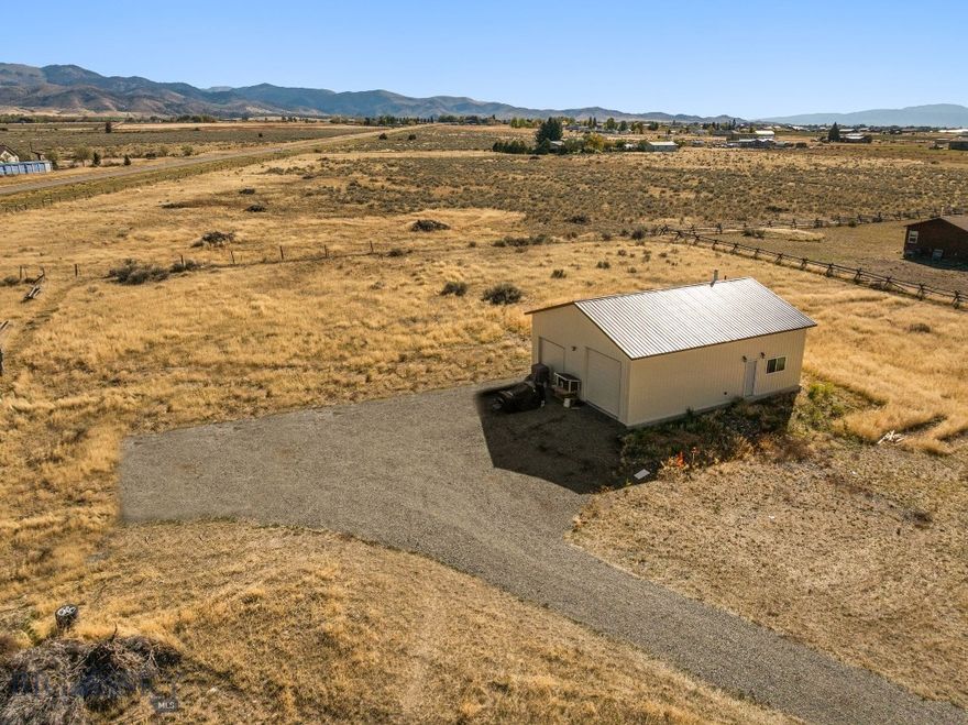 Enjoy the beauty of rural Montana on this 2.6-acre parcel located just outside Sheridan. With sweeping mountain views and quick access to both Sheridan and Twin Bridges, this property offers privacy, functionality, and proximity to endless outdoor recreation.
The property is ready for you to build your forever home, with essential infrastructure already in place. A newly built (2024) 30' x 40' insulated shop adds tremendous value, featuring 12-foot ceilings, a wood stove, full kitchen and bathroom, laundry hookups, and a private well and septic system. Most of the interior has been thoughtfully converted into comfortable living space, making it ideal as a full-time residence, weekend getaway, or base camp for hunting and fishing adventures.
With light covenants and close proximity to BLM and State land, this property provides an ideal blend of freedom and convenience for outdoor enthusiasts. Whether you're looking to build, expand, or enjoy it as-is, this is a rare opportunity to own usable, scenic acreage in one of Montana's most sought-after valleys.