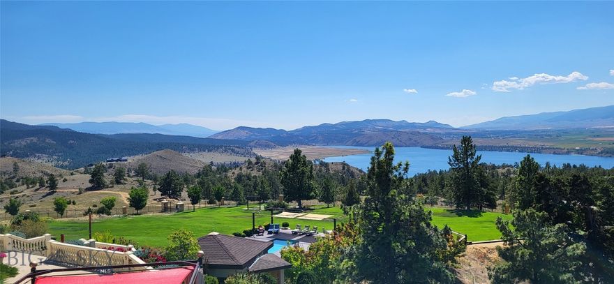 Welcome to The Ting, a spectacular Mediterranean-style estate that brings together stunning lake views, fantastic amenities, and luxurious accommodations. Ting is the sound of celebration. This home is about entertainment and fun. Your family and guests will enjoy the beautiful state of the art stainless steel pool, hot tub, boccia ball court, golf putting green, tiki bar, horseshoe pit, and an expansive lawn. Sit on the white sand beach area with a cool drink and take in the view. Adjourn to the fire pit to swap stories of the day’s adventures. The Ting is a private gated estate on 20 acres overlooking Hauser Lake. The property consists of two luxurious residents joined by a breezeway, making this the perfect property for multi-generations or co-owners. The 3650 sq. ft. main house has three bedrooms, an impressive great room with a wall of windows, chef’s kitchen, library, theater room, and office. The 3760 sq. ft. guest house has two en-suite bedrooms, a spacious great room with floor to ceiling windows to capture the view, large kitchen, sunroom in the tower, sauna, well-equipped home gym, and art studio. The beautiful, colorful gardens and waterfall invite you outdoors. Large patios and deck areas are perfect for entertaining and outdoor dining. Home is being sold furnished. Guest house is currently a short-term rental.