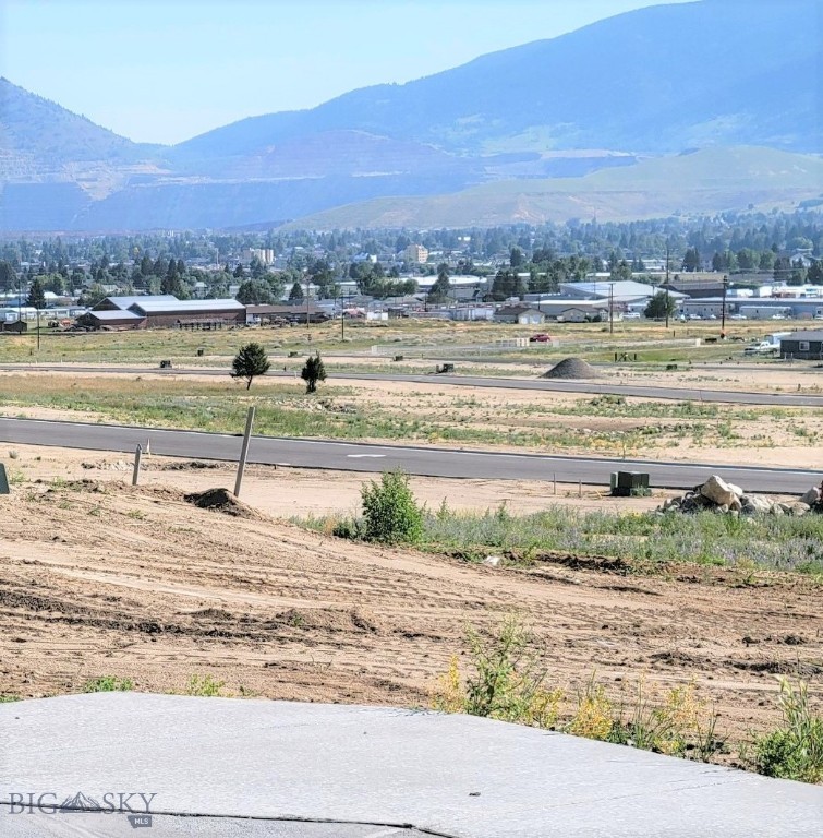 Just completed 83-unit subdivision. Curb, gutters, asphalt streets, underground utilities to all building sites. 1 block to Margaret Leary School. Tax value is TBD by Butte Silver bow.