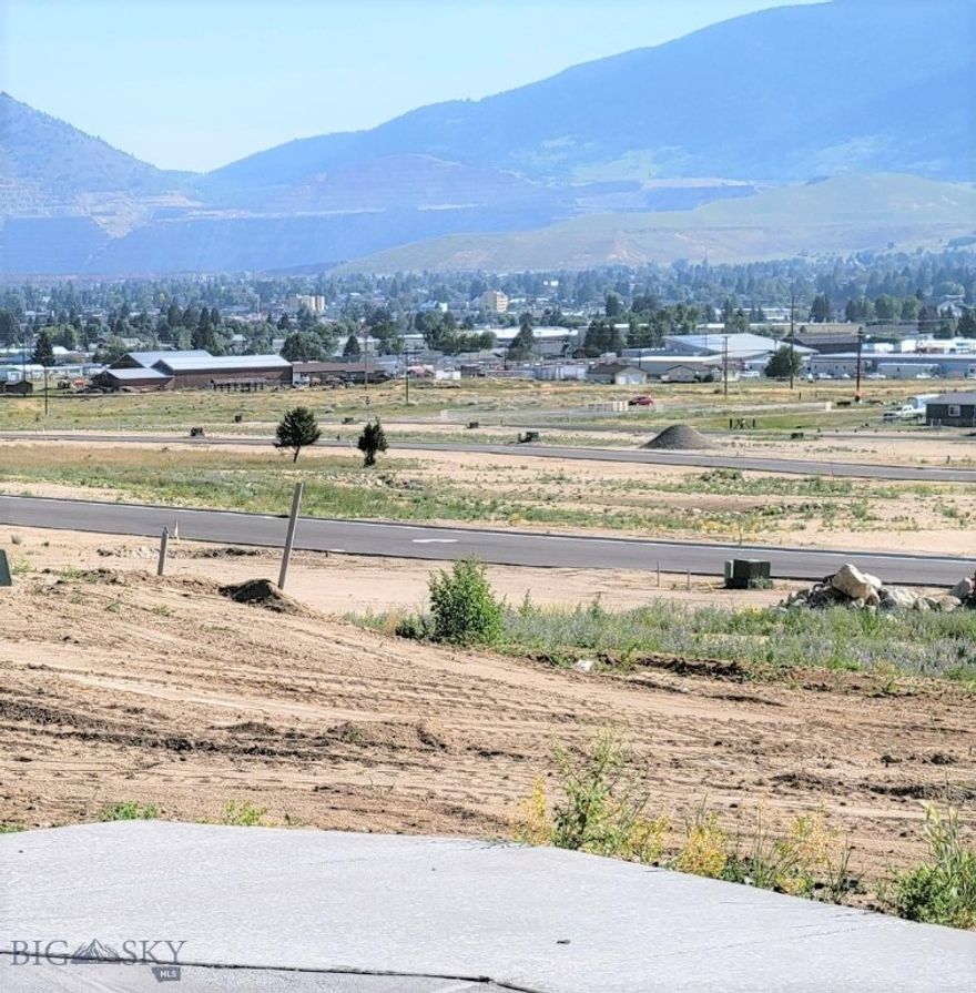 Just completed 83-unit subdivision. Curb, gutters, asphalt streets, underground utilities to all building sites. 1 block to Margaret Leary School. Tax value is TBD by Butte Silver bow.
