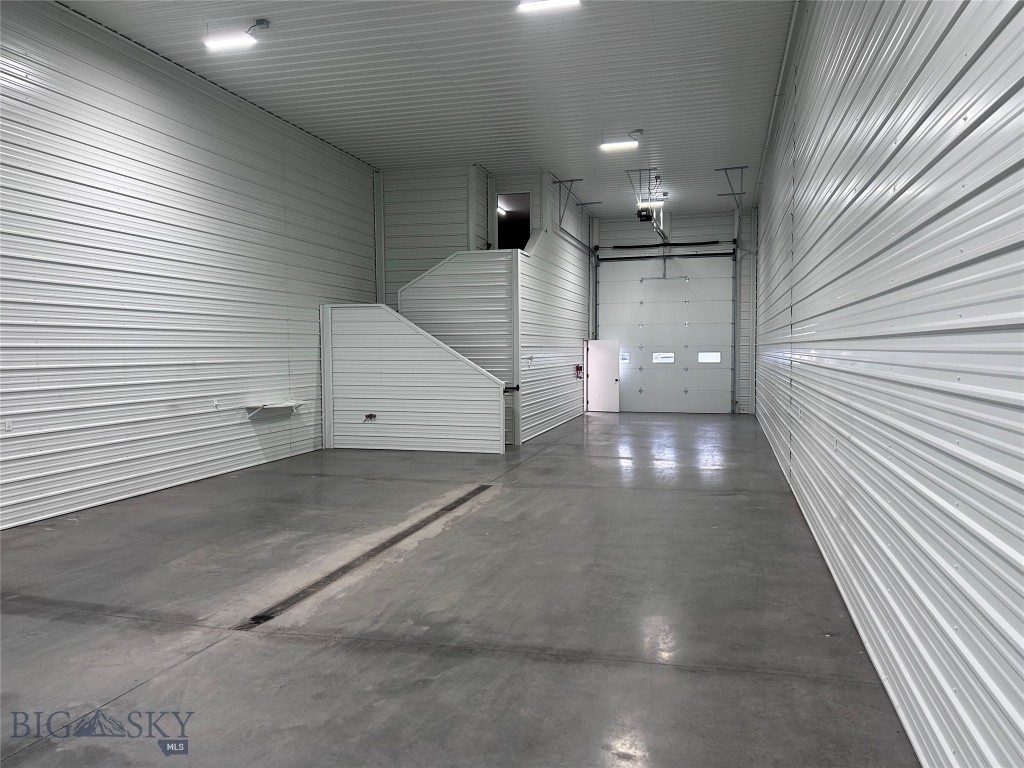 Nice new build warehouse units in convenient location just a block off Jackrabbit Lane in Belgrade city limits right behind Wendy's and Goodwill. The main level of Unit 2 is 1,948 SF of mostly open warehouse space with a windowed office and restroom. There is a large overhead door into the warehouse space, and a man door into the office/showroom space. The mezzanine level is an additional 255 SF. The building location and design work well for warehouse/workspace; customer facing business; shop/office combo, and more. Also available for sale.