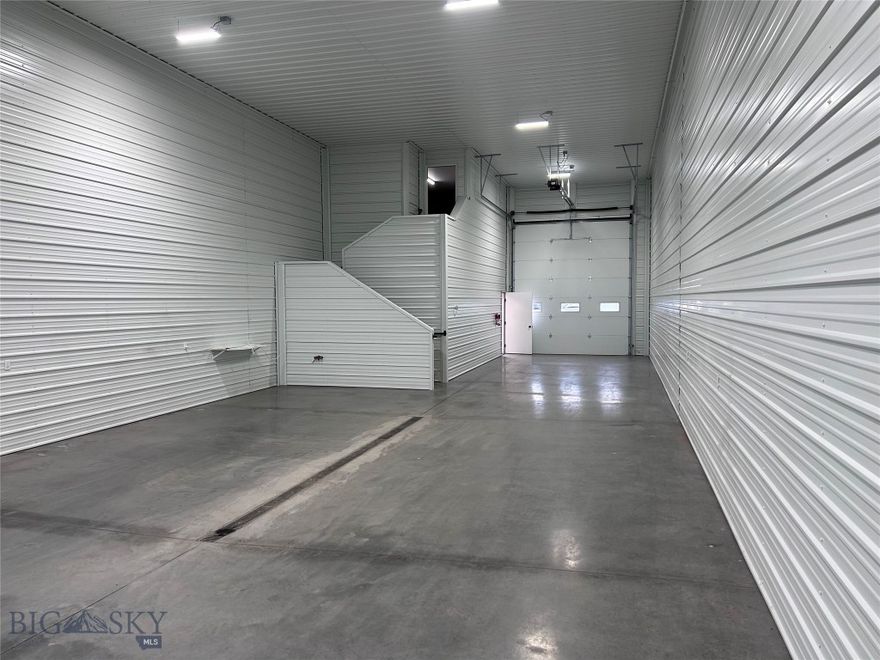 Nice new build warehouse units in convenient location just a block off Jackrabbit Lane in Belgrade city limits right behind Wendy's and Goodwill. The main level of Unit 2 is 1,948 SF of mostly open warehouse space with a windowed office and restroom. There is a large overhead door into the warehouse space, and a man door into the office/showroom space. The mezzanine level is an additional 255 SF. The building location and design work well for warehouse/workspace; customer facing business; shop/office combo, and more. Also available for sale.
