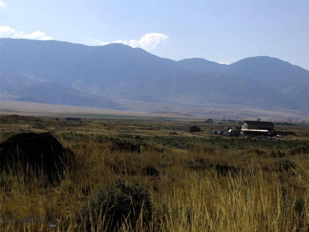 Escape to Montana! Maybe these 21.9 acres at the end of the road and the foot of the Beartooth Mountains with Majestic Beartooth Mountain views would fit the bill. Power is 700 feet to the north and Hwy 72 is 4 miles to the east. It borders public land to the east and is a quarter mile south of 1000's of acres of public BLM land. It is 6 miles from the National Forest and a mile west of the Clark's Fork of the Yellowstone River. Belfry (pop 200) is only 13 miles away, while Red Lodge is 28 miles where there is a ski area. This property has views of the Pryor Mountains and Clark's Fork of the Yellowstone River valley as well as the Beartooths, the Abasaroka Mountains. Yellowstone National Park is 90 miles by road; Billings is just 60 miles to the northeast. This is a great area for for relocation or a getaway cabin! Mild covenants, but no HOA. Adjacent 22 Acre parcel is available. Owner financing with 25% down.