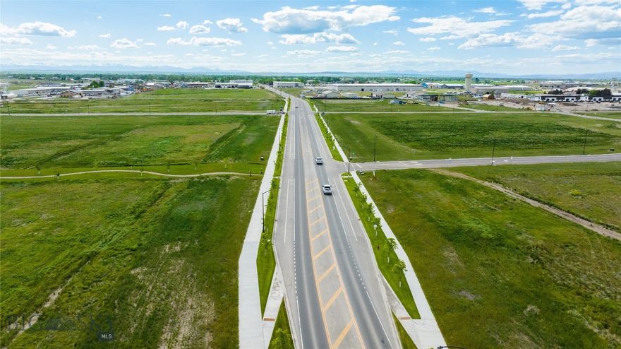WEST POST is now offering commercial lots for sale at the I-90 Airport Interchange at Airway Boulevard and Frank Road in Belgrade, MT, just 6 miles west of Bozeman. The recently completed Frank Road will become the primary East/West connector to Jackrabbit Lane/US 191. This premier commercial development, with lots now under construction, is located within Belgrade City limits, providing all utilities and city services to the development. Phase 1 of WEST POST will have 36 lots and pad sites ranging from 0.7 to 6.2 acres, fully entitled for mixed-use development, with ideal sites for: hotels; restaurants; retail stores; offices; light industrial buildings; medical offices and many other uses. WEST POST is located less than a mile south of the Bozeman Yellowstone International Airport, and adjacent to the I-90 Interchange.  Block 4 Lot 4 is on Frank Road and would be a great location for retail, restaurant, etc.