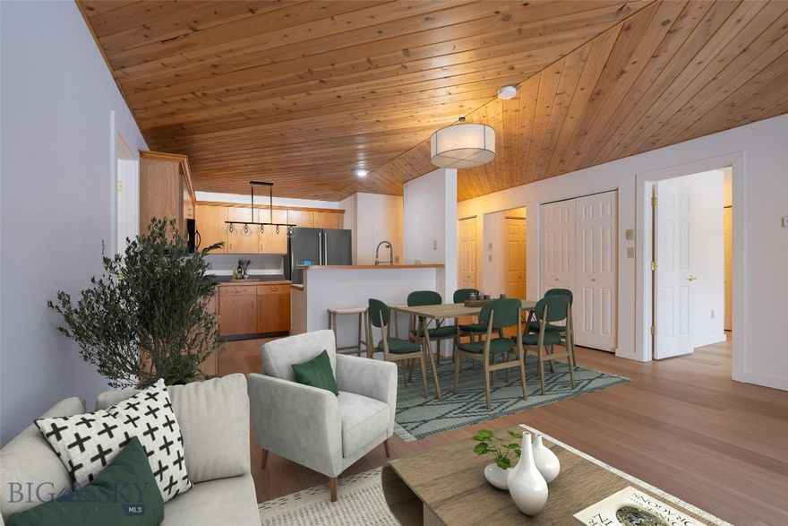 "You may find yourself in a beautiful house / With a beautiful wife / And you may ask yourself, 'Well, how did I get here?'" - Talking Heads, Once In A Lifetime. Firelight B2 is the your way into David Byrne's lyrical world and the lifestyle afforded by an address in Big Sky. Surrounded by biking trails and fishing spots and community events, this condo, your life in the mountains starts at this doorstep. Two suites buttress the open concept living and kitchen area, providing a nice layout for privacy. Being on the south and eastern corner and ground floor gives you extra windows, passive solar exposure, and the opportunity to walk from your covered patio directly to your vehicle. There are new appliances (including commercial grade washer & dryer), fresh paint and beautiful new flooring. Outside, you can install a hot tub or enjoy the mature landscaping and HOA managed yard space. The HOA takes care of everything on the exterior, including the recent installation of a new cold roof, and nearby trash and recycling. Long term and nightly rentals are permitted. This would be a great candidate for the Big Sky Community Housing Trust's GOOD DEEDS program which offers down payment assistance in exchange to a permanent deed restriction. Offered unfurnished and ready for immediate occupancy.