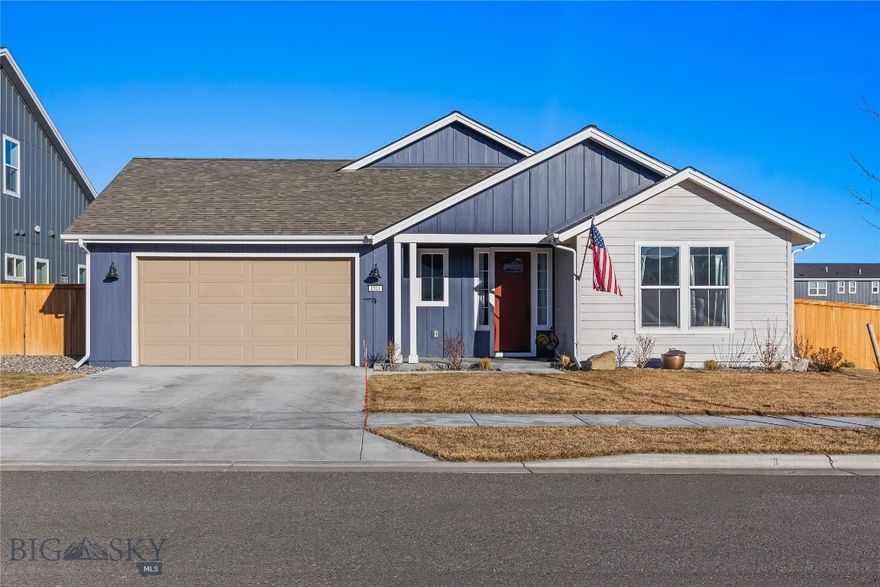 Located in Prescott Ranch, this 2023 single-level home welcomes you with an open floor plan and abundant natural light. Set on a spacious 0.2-acre corner lot, the 3-bedroom, 2.5-bath layout features tray ceilings and an efficient, functional design.

The living room centers around a cozy gas fireplace, with custom built-in shelving and a built-in desk creating a practical office nook. Granite countertops, ample cabinetry, and an easy connection to the main living areas define the kitchen, making it ideal for daily living and gatherings. The primary bedroom offers an ensuite bathroom and a generous walk-in closet.

Air conditioning, a covered patio, an oversized two-car garage, underground sprinklers, and a fenced backyard add to everyday comfort and convenience. Located just two blocks from the neighborhood park, with easy access to the airport and Bozeman.