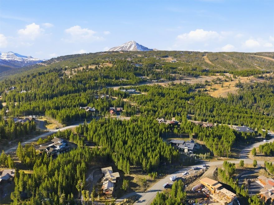 This premier 1.01-acre homesite in Spanish Peaks Mountain Club offers ski in ski out access and expansive views of the Spanish Peaks and Gallatin Range. Set above open space, the property captures beautiful sunrise and sunset light. Ideally located just minutes from the private clubhouse, featuring dining, golf amenities, and member services, and near the Montage Big Sky with member benefits, while remaining only about 10 minutes from Big Sky Town Center. A Spanish Peaks membership is required with purchase.  A Golf membership is available with this property.