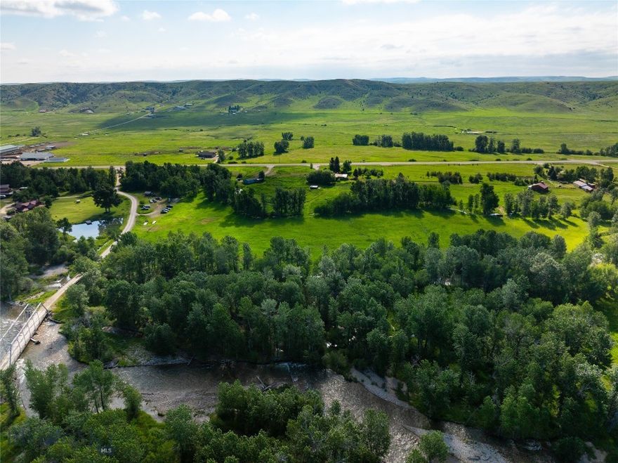 *See Video/Virtual Tour* Nestled in a scenic valley with deep ties to its ranching history, reminiscent of old Montana, this one-of-a-kind offering is a true private, recreational oasis! Sitting on the historic Bozeman Trail and the banks of the East Rosebud River, this 19+ acre getaway offers prime trout fishing on one of Montana's most coveted fisheries. Two additional creeks, Agency Creek and Sheep Creek, meandor through the property and feed the lush meadows in between, providing ideal grazing ground for animals and abundant wildlife. Enjoy the serene setting and breathtaking views of the Beartooth Mountains while only being a short 5-mile drive to the charming town of Absarokee, and 15 minutes from Columbus/Interstate 90. The modest 5-bedroom home sits above the property and provides a perfect basecamp for all your outdoor pursuits - hiking, rafting, hunting, fishing, kayaking, biking and more are waiting just 15 minutes away in the Custer National Forest and on the famous Stillwater River. Another 3-bedroom manufactured home is also on site ready for use. Enjoy year-round recreation with the quintessential western town of Red Lodge and Red Lodge Ski Hill just a short 30-minute drive from the property. Utilize the current home as-is, add your personal touch ups and remodel, or build a new home on site with a mix of meadow and river views and the Beartooth Mountain Range in the backround. New building site is out of the floodplain and marked by survey.