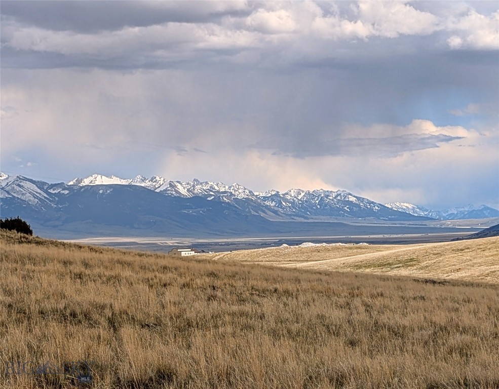 Lot 193A Hilltop Trail – Shining Mountains I | 5.144 Acres | $175,000
Perched in an elevated position on Hilltop Trail, this 5.144-acre lot in Shining Mountains I offers breathtaking views down the Madison Mountain Range and across the Madison Valley. The property provides the perfect setting for a mountain retreat or year-round home, with open build sites and dramatic big-sky vistas.
Located just off the county maintained road and 10 miles south of Ennis, the lot offers easy access to world-class fishing on the Madison River, public lands, and the abundant recreational opportunities that make Southwest Montana so desirable. Power is close by and fiber optic communication lines are to the property, making it ready for your vision. Priced below recent appraised value.  
Whether you're seeking privacy, stunning scenery, or proximity to Montana's outdoor lifestyle, this lot delivers.