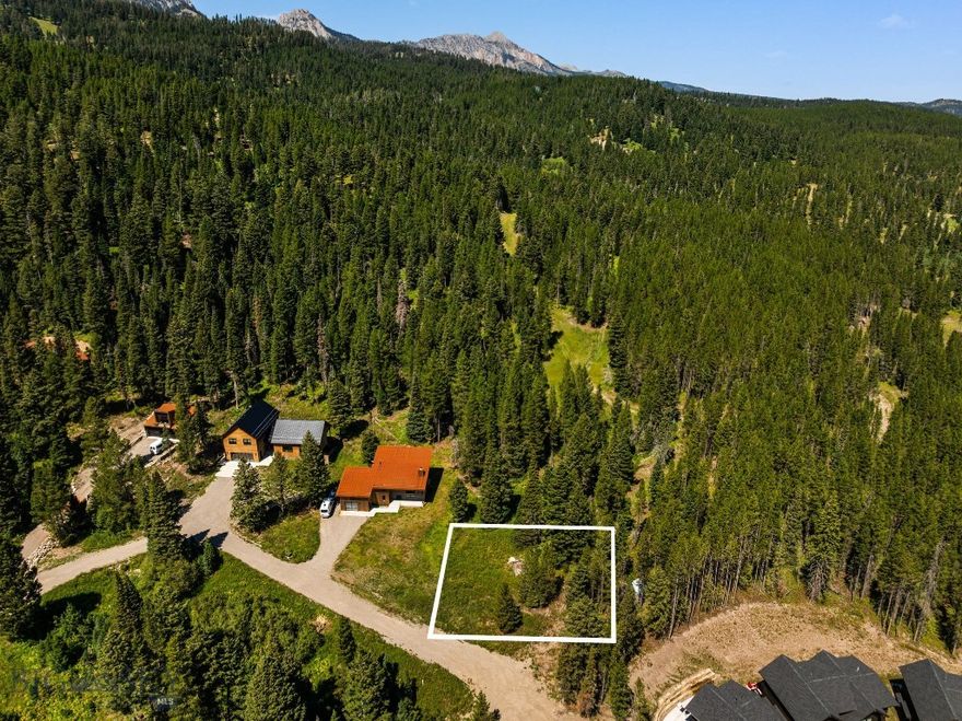 Opportunity waits for a mountain home on this end of the road mountain lot.! Just minutes from Bridger Bowl Ski area & adjacent Crosscut Mountain Sports Center this lot offers an array of nearby outdoor opportunities.  If you are looking for a ski-in-skin-out lot adjacent to Bridger Bowl, at a reasonable price, you better act fast.  Only 15 minutes from Downtown Bozeman. Plenty of room to build on the 0.23 of an Acre, which feels much bigger with all the open space.   Power, water, & sewer to the lot.  All information is deemed reliable, but not guaranteed, buyers & agents to verify all information.