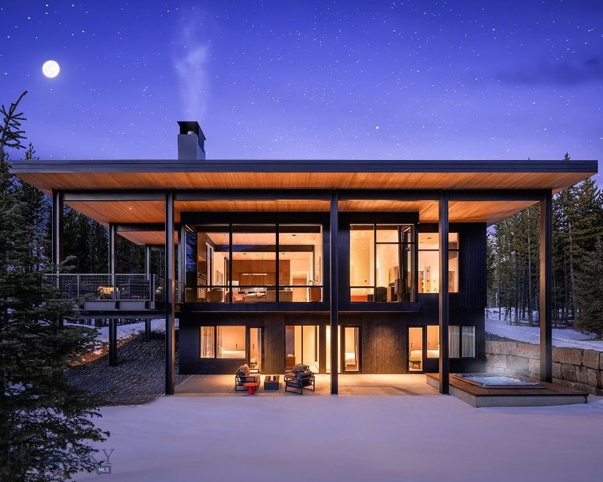 Set amidst the untouched beauty of Montana’s alpine wilderness, this One&Only Moonlight Basin Private Home is a masterful blend of contemporary design and natural harmony. Surrounded by towering evergreens and dramatic mountain peaks, the residence is thoughtfully crafted to reflect and celebrate its remarkable setting.

This five-bedroom retreat spans approximately 3,670 square feet, offering expansive indoor and outdoor living designed to immerse you in Big Sky’s four-season splendor. Floor-to-ceiling windows frame panoramic views, while roaring fireplaces and timeless finishes create an atmosphere of elevated comfort and understated luxury.

The open-concept layout flows effortlessly from interior gathering spaces to generous terraces and outdoor lounges—perfect for entertaining or unwinding under Montana’s vast skies. Whether enjoying the glow of sunset over the peaks or cozying up after a day of skiing, hiking, or fly fishing, this residence offers the ideal space to gather, recharge, and reconnect.

Located within the exclusive One&Only Moonlight resort, this home offers privileged access to a world-class collection of amenities, including fine dining, wellness, and outdoor adventure—all delivered with the renowned service of One&Only.

This is not just a home—it’s a sanctuary in one of the most awe-inspiring corners of the American West.
