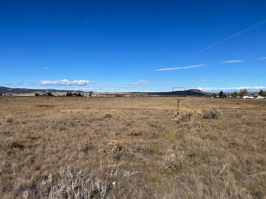 A rare and exceptional offering for developers and builders! Secure this expansive 12.98-acre parcel (Tract 1) on the desirable Terra Verde Drive. With R-1S (One-Family Suburban Residential) zoning, this property provides the potential for a high-yield, single-family residential subdivision. Or this parcel would work perfectly for the single user who wants space and privacy. The scale and desirable location make this one of the most attractive development opportunities in the Butte market today.