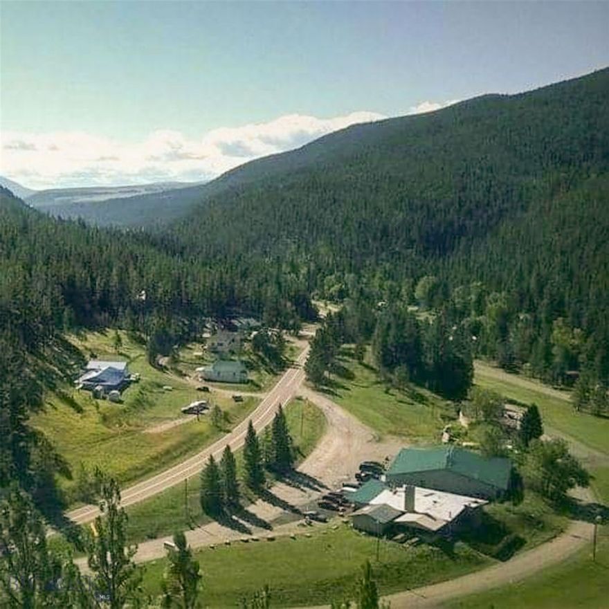 Invest in this multi-faceted commercial package in a mountainous setting, with high traffic counts and an established client base. You are buying a 14 unit motel with pool and hot tub, a full restaurant and bar, to include a liquor license, and gaming, plus a scenic acre+ and what has evolved into an indoor, and outdoor, music venue with stages and outdoor seating, a newer detached, fully-enclosed metal building, a 3500' basement apartment/owner's suite AND a convenience store. Monarch is just minutes to Showdown Ski resort, snowmobiling and it is in close proximity to 1000's of Forest Service acres, lakes, creeks, trails and more, so tourists flock to the region. From a commercial perspective, this is vital to the health of the business because it does not rely on a short, seasonal season. There is so much here for the money to also include all furnishings, full commercial kitchen equipment and everything proprietary. SELLER WILL CONSIDER CARRYING A CONTRACT/SELLER FINANCING!  
Build a wedding venue, establish corporate retreats and/or grow the existing business. Newer metal garage/shop is 32 X 36 with 10' walls. There are gas pumps on the property. They are not currently operational, but seller says they could be. Multiple, divided lots. Full equipment list available to buyers. Metal roofs. Handsome, newer entry from front door into restaurant and bar. Game room. Double bathrooms by restaurant/bar. Employee restrooms near kitchen. There is a stone fireplace insert in the bar and a woodstove in the basement suite. Suite has bathroom, bedrooms, living space, a kitchen and a ton of storage.