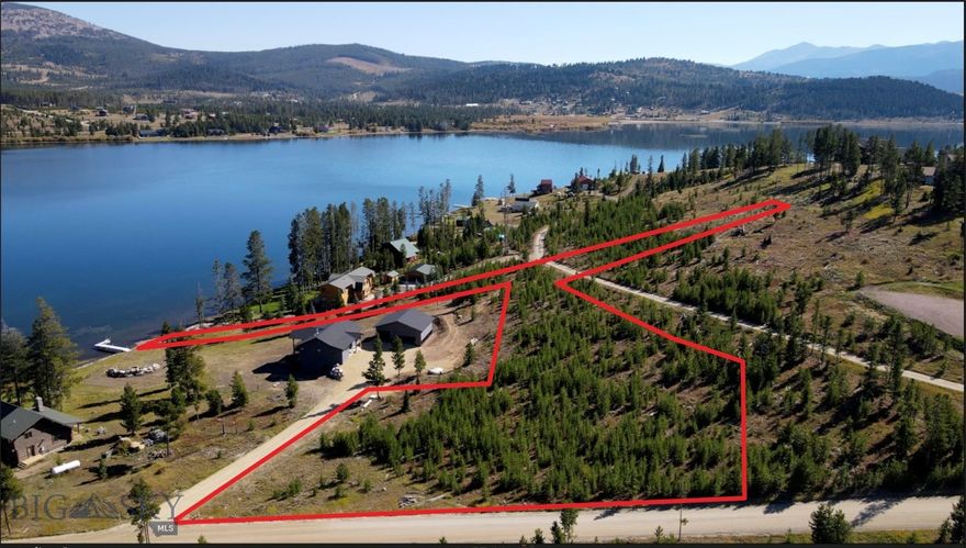 1.6 acre at Georgetown Lake - Build your dream primary or second home in one on Montana's premier all-season playgrounds. The property is near the lake on Philipsburg Bay, in fact it has approximately 10' of lake access.  Georgetown Lake is one of the best all-season recreational areas in all of Montana, rich in recreation, wildlife and scenery. boating.  Enjoy fishing, hiking, 4-wheeling, golfing, skiing at Discovery Basin Ski Resort, snowmobiling, hunting are all out your back door or minutes away. Just off Montana Highway 1 mid-way between Anaconda and Philipsburg which are only 20 minutes away. Less than an hour to Butte and two hours to Missoula. Year-round access via well maintained road to the property. (See the aerial video attached to this listing to get a good visual of the property and surrounding lake and mountains).