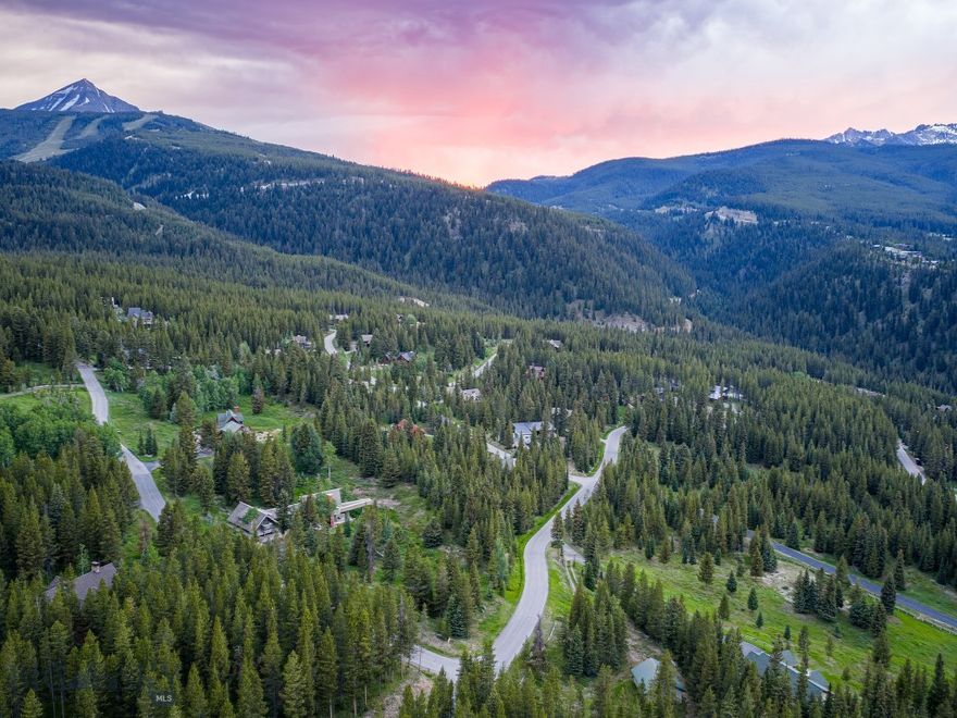 Nestled in the highly sought-after Aspen Groves Subdivision, this 0.912-acre lot offers the ultimate Big Sky mountain living experience. Surrounded by serene forests and abundant wildlife, it provides the perfect retreat, immersing you in nature’s beauty. Direct access to the Big Sky trail system allows for seamless outdoor exploration—whether you're hiking, biking, or enjoying leisurely walks or skis. These trails open up a world of adventure, connecting you to the breathtaking landscape at your doorstep.

The lot offers stunning views of Lone Mountain, serving as a magnificent backdrop to daily life and providing the perfect setting for unforgettable sunrises and sunsets. Whether it’s the snow-covered winters or the vibrant, warm summers, the panoramic views are awe-inspiring year-round.

In the exclusive and private setting of the Aspen Groves neighborhood, enjoy the best of both worlds—peaceful seclusion combined with a strong sense of community. Despite its quiet and upscale atmosphere, the vibrant Big Sky town center is just a short drive away, offering dining, shopping, and entertainment options.

This 0.912-acre lot embodies the quintessential Big Sky lifestyle, offering a rare blend of natural beauty, outdoor recreation, upscale living, and easy access to everything you need. It’s the ideal place to call home for those seeking an unparalleled mountain living experience.