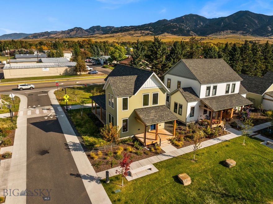 Welcome to Bridger View! The only home currently available in this recently completed pocket neighborhood on Bozeman's northeast side is exceptionally livable, with greenspaces, a common house, and pathways connecting to the adjacent Story Mill Park, and downtown Bozeman. This barely lived in home is constructed to LEED Platinum standards, designed & built to promote community, health, efficiency, and value. Large, livable decks, abundant natural light, healthy indoor air, and natural/sustainable interior finishes are a few of the components in each home. Highly efficient building envelopes with superior insulation, triple pane windows, water-saving fixtures, Energy Star appliances, and waterwise landscaping will help keep your utilities low, and maintenance to a minimum. This Farmhouse 3 floor plan, feat. 3 bedrooms, 1 1/2 bathrooms, PLUS an unfinished basement for storage or future expansion. Exquisitely finished with maple hardwood flooring, solid fir doors and cabinetry, and gorgeous tile work. This home has received many upgrades, including maple hardwood flooring throughout the upper level bedrooms, and multi-split AC units in each upstairs room. Come visit Bridger View, and See What's Possible.