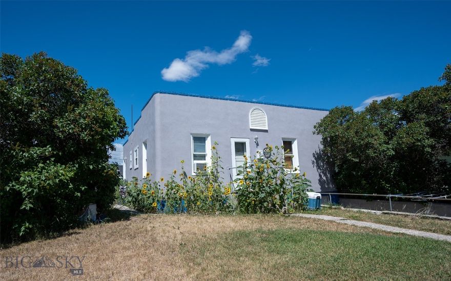 Looking for a cozy, move-in ready, starter home or investment property that is close to the university, the schools and downtown Dillon? Built in 1945, it features original hardwood floors and solid wood doors that highlight its vintage character. The downstairs basement has the laundry area and lots of space and storage. Step outside to a spacious, fully fenced backyard—perfect for your children or pets, or maybe some gardening. Mature lilac bushes frame the front of the residence, giving a sense of privacy, along with the wonderful scent of the lilacs in the spring. Call today for more information or to schedule a private showing!