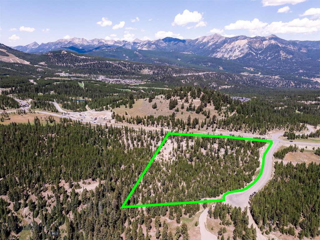 Discover the perfect balance of privacy, mountain beauty, and world-class amenities with this rare 5.87-acre homesite in Seclusion Point at Spanish Peaks Mountain Club. Tucked into a quiet enclave with breathtaking views of Lone Peak and surrounding wilderness, this property offers the ideal setting for your Montana dream home.
Perched on an expansive lot, Lot 157 provides ample space for a custom residence that captures panoramic mountain vistas and maximizes year-round outdoor living. Mature pines and open meadows create both seclusion and connection to nature, while the property’s elevated position ensures dramatic sunrise and sunset views.
Ownership includes the option of a Golf Membership at Spanish Peaks Mountain Club, granting access to the award-winning Tom Weiskopf-designed golf course, clubhouse, dining, and exclusive member amenities. In winter, enjoy direct access to Big Sky Resort’s legendary skiing through the club’s private trails and ski-in/ski-out opportunities.
With nearly six acres of pristine Montana landscape and direct ties to one of the region’s premier private communities, Lot 157 at Seclusion Point is a legacy property offering both sanctuary and adventure.
