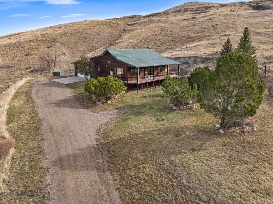 Welcome home—where open space and country living come together on 18+ acres of fenced and cross-fenced land. This beautifully maintained 3-bedroom, 2.5-bath home offers 2,520 square feet of comfortable living, featuring a main-level primary suite, spacious gathering areas, and abundant natural light throughout. Thoughtful updates include newer appliances, updated bathrooms and basement spaces. This home also has a durable metal roof for low-maintenance living. Equestrian enthusiasts will appreciate the exceptional setup—complete with a 60’ x 120’ riding arena with power and a 56’ x 40’ horse barn. Bring your horses, chickens, this property is ready for it all. Located just a short drive to Great Falls, you’ll enjoy the perfect balance of peaceful rural living with convenient access to shopping, dining, and the airport.