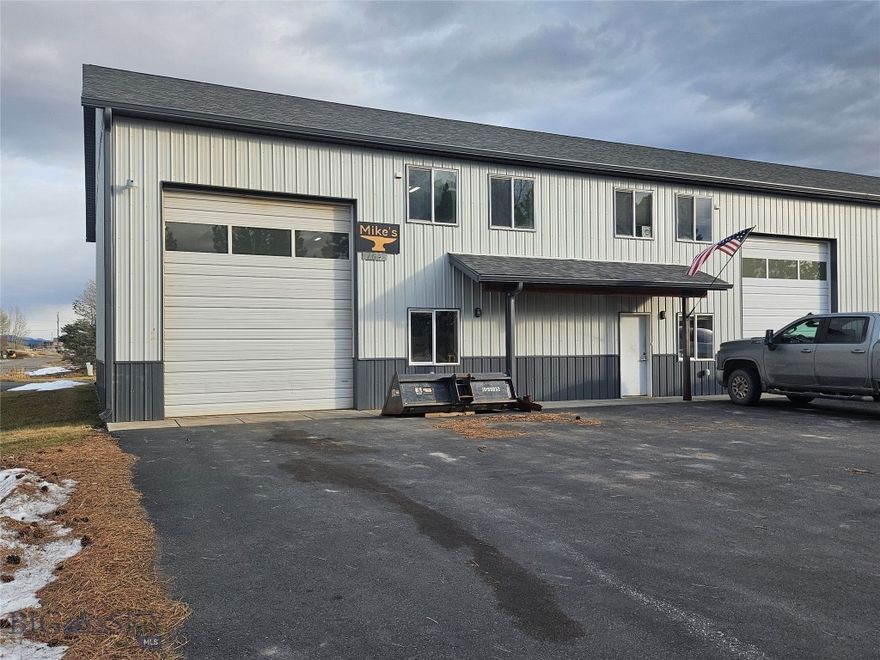 Two combined +\- 4032 SF Commercial condos with finished apartment in Four Corners. Shop area is +\- 3360 SF with two bathrooms. Four 12' wide, 14' high garage doors (front and back) with a single front door. Ceilings are 18' high in the shop area. 400 AMPs of 3-Phase power, radiant heat, R-43 ceiling insulation, R-21 wall insulation, 2x8 stud construction and metal siding. +\- 672 SF office / apartment above the shop area with modern finshes. Both shop area and office / apartment share the same address, front door.  There are two utility meters. New roof installed summer 2024.