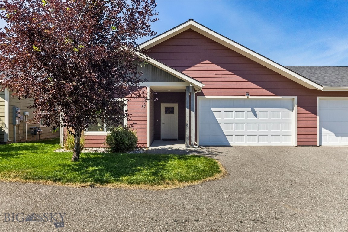 Tucked into a quiet loop near the Gallatin River, 37 Voyager Lane offers comfort, privacy, and thoughtful finishes in a low-maintenance setting. This 3-bedroom, 2-bathroom end unit backs directly to open space—bringing a rare sense of quiet and connection to nature just minutes from shopping, parks, and trails.
Inside, you’ll find circle sawn hardwood floors, solid wood doors and trim, and tall ceilings—vaulted in the main living area for added volume and natural light. The open floor plan flows seamlessly out to a private, fenced concrete patio with Bridger views and lush chokecherry bushes. The kitchen features leathered granite countertops, a gas range, bar seating and quality cabinetry.
The primary suite is separated from the other bedrooms for privacy and includes its own patio access, large closets, and a well-appointed bathroom with dual vanities. Other highlights include central AC, bright light fixtures, great storage, and a two-car garage with floor to ceiling shelves.
HOA covers exterior maintenance, landscaping, and insurance—making this a great option for low-maintenance living or a lock-and-leave lifestyle.
Whether you're downsizing, investing, or just seeking simplicity with scenery, this gorgeous condo is worth the look.