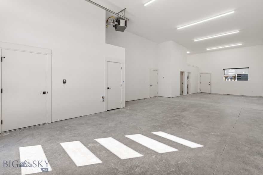 Brand new Live/Work units available in Belgrade. These high-end units feature thoughtfully designed commercial spaces that are over 1,200 sq ft with 12' overhead doors, open shop space, bathroom, kitchenette, storage and an office. The second floor features a 2 bedroom 2 bath apartment with a patio. Affordably priced for a number of different uses. Second floor can also be used as a high end office/showroom. Available NOW!. New photos after completion. $3,500/m
