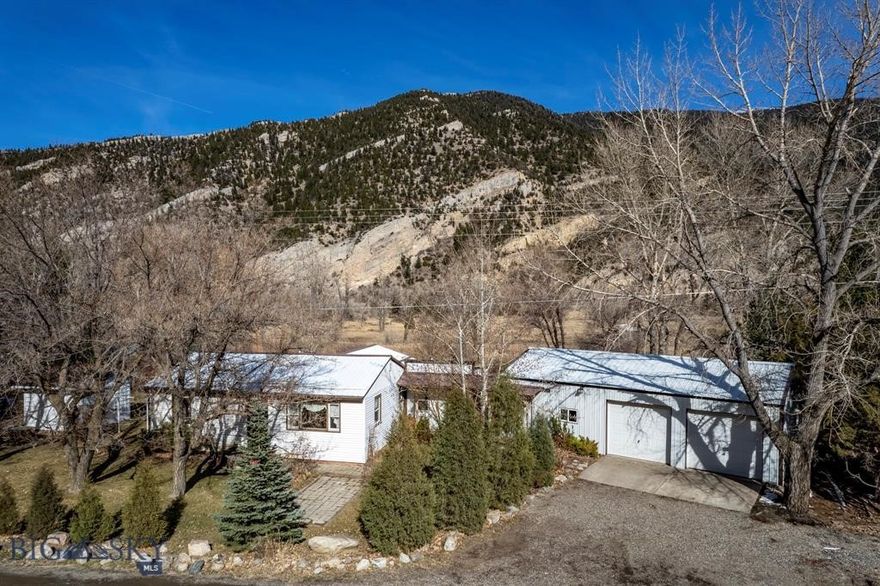Why go on vacation when you can own it!!! 7.449 acres of playground. Grab your fishing rod, gear, toys and walk or ride down to your riverfront access to the Yellowstone!  This sweet 2 bed, 1 bath home comes with an oversized insulated garage with large shop space. Seasonal enclosed porch to enjoy those summer days and nights. Great yard with mature landscaping. Opportunities like this are getting rarer. On the route to the amazing Yellowstone National Park, I90 to Bozeman, short drive to Emigrant to take in the outdoor concerts, close to Chico Hot Springs and Sage Lodge. During our 100 year flood in 2022, the lower part of the house took on water, but the main part stayed dry. New insulation, sheet rock and flooring have been replaced. The river is calling and the fish are biting!