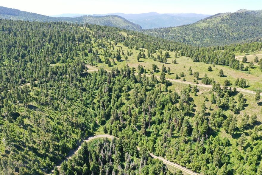 Off-Grid Montana Land for Sale – Garnet Range, Drummond MT Discover this stunning 158.4+/- acre property in the Garnet Range near Drummond, MT—a rare opportunity for those seeking Montana recreational land with true privacy and beauty. This off-grid property features seasonal springs, mountain views, and diverse terrain that includes wooded areas, open meadows, and rock outcroppings. Ideal for nature lovers, hunters, and those dreaming of a private Montana retreat, the land is home to abundant wildlife and offers excellent potential for horse property or secluded building sites. Located in Granite County, with gravel road access and no HOA, this is a piece of Montana acreage to create your own escape.