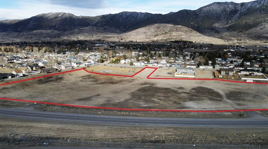IDEALLY SUITED FOR RESIDENTIAL DEVELOPMENT - 10.26 acres  — single-family, multi-family, or a mixed-use concept. Located within an infill area with established city infrastructure, the property benefits from nearby access to all major utilities, including electric, natural gas, water, and sewer. The site offers strong development flexibility with three potential access points—two from Mt. Highland Drive and one from Milky Way. Development opportunities like this in Butte are rare, with very few in-town parcels remaining that can accommodate residential development at this scale.