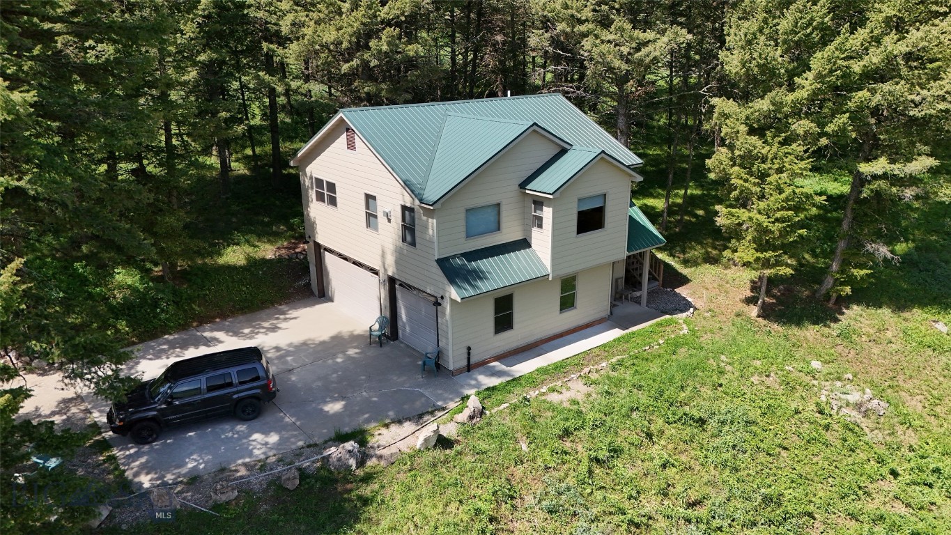 Buffalo Lance Ranch, Parcel 24 is a gem! It borders National Forest on the west and south sides. It has an existing cabin that is a perfect vacation getaway.  There is one legal bedroom with closet and one extra room that is being used as a bedroom.  Sleeps up to 6.  All of the basic furnishings are included with the sale. The covenants have expired, and there is no county zoning, so no restrictions exist. It borders an outstanding hunting area (owner claims about 2,500 head of elk come over Horn Mtn and the property every year, in the fall). In the spring, cow elk calve their young in the Aspen tree hollow, just to the east of Parcel 25. And a cow moose and her young visit every year. The property is centrally located...2 hours south of Bozeman, 1 hour south of Ennis, 35 minutes from the West Gate of Yellowstone National Park and approx. 2 hours from the beginning of The Grand Tetons National Park. It is only a few miles from the world-famous Blue Ribbon trout waters of the Madison River, plus Hebgen, Earthquake, Cliff, Wade, Elk and Hidden Lakes are all nearby, as well as Henry's Lake in Idaho. The property is just 3 miles North of the Idaho-Montana border, in an end-of-the-road, peaceful, family-friendly environment with lots of scenic activities & many places to explore! The Seller is offering Parcels 23, 24 and 25 individually, in any combination, or all together as a package, for $1,573,000.
An active tenant is leasing the cabin on Parcel 24.  Upon closing the tenant will be given a 30-day notice to be out of the house and off the property.  Bayer may take occupancy 31 days followng closing.