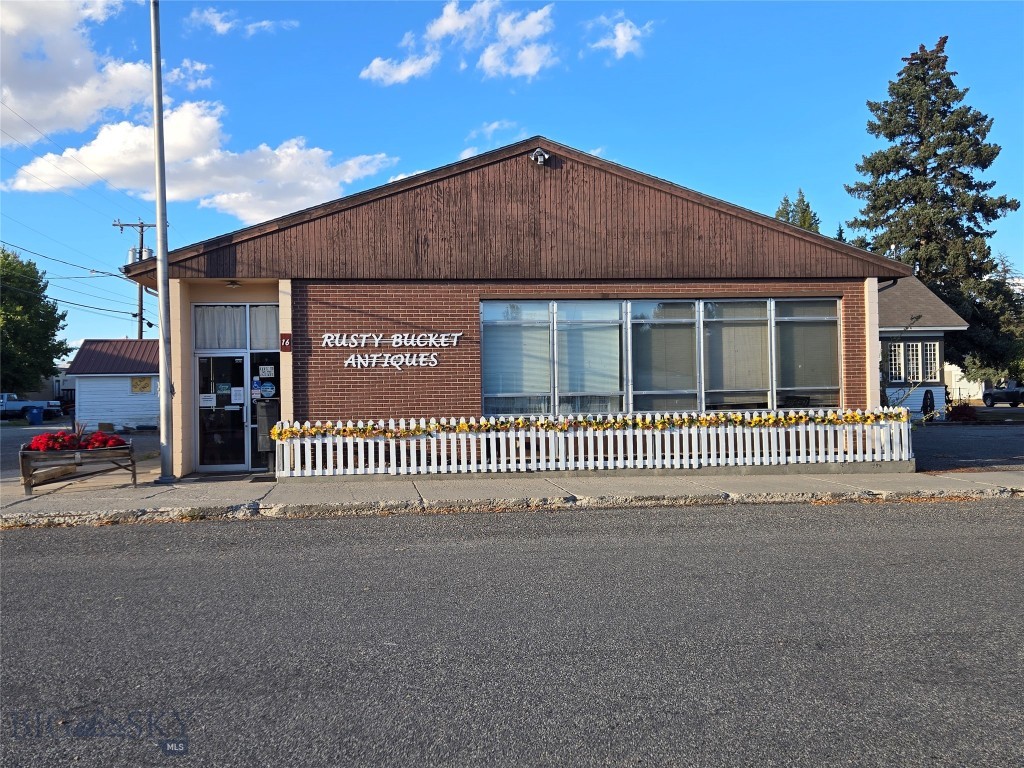 Rare find commercial building with off street parking in downtown Three Forks. Well cared for property just 1/2 block off Main. It was built as the old post office and is a solid cinderblock building with a total of 1932 sq ft on a 7020 sq ft lot with a large parking lot. Currently leased to a well run antique store which is not included with the sale. Properties like this do not come around often and would make a great investment property or a great location for your own business. Call your favorite Realtor before it is gone.