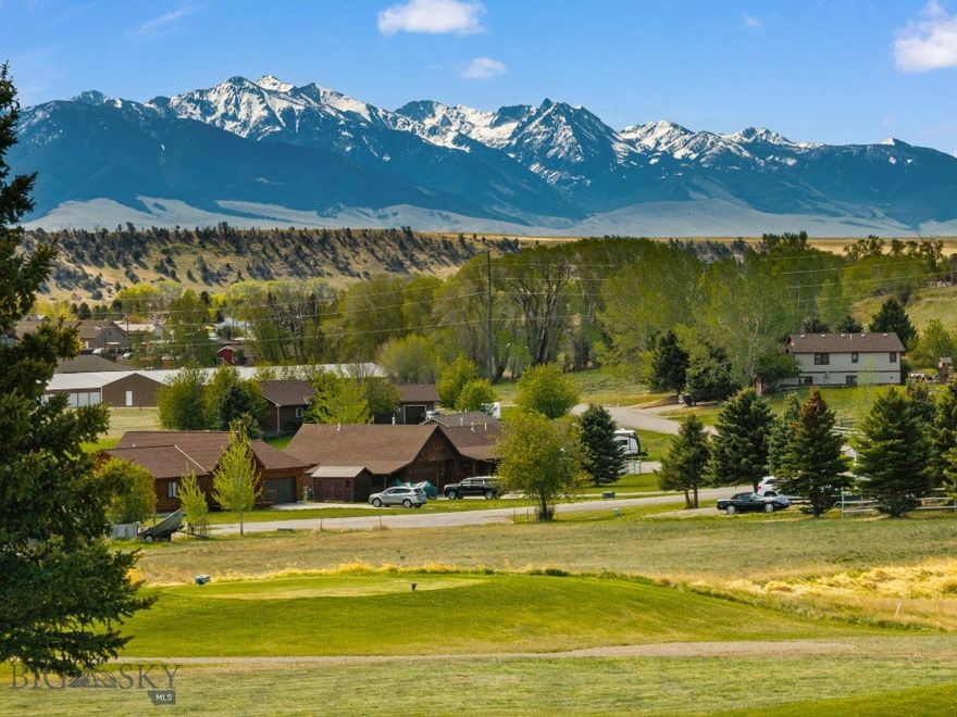 Discover the perfect setting for your Montana dream home on this exceptional .928± acre homesite located on Hilgard Court in the sought-after Valley Garden Golf Village in Ennis, Montana. Nestled alongside the golf course and surrounded by breathtaking mountain vistas, this property offers a rare opportunity to build in one of Southwest Montana’s most scenic and peaceful communities. From snowcapped peaks to rolling fairways and wide-open skies, the views in every direction capture the beauty that makes Ennis such a desirable destination. The spacious lot provides ample room to design and build the custom home you’ve always envisioned while still enjoying privacy, open space, and easy access to outdoor recreation. Positioned on the golf course with nearby paths, mature landscaping, and the tranquil setting of the valley, this property offers an ideal blend of recreation and relaxation. Whether you are looking for a full-time residence, seasonal retreat, or investment opportunity, the setting is truly hard to match. Located just minutes from downtown Ennis, you’ll enjoy convenient access to local dining, shopping, fishing on the world-famous Madison River, recreating at nearby Ennis Lake, and endless outdoor adventures including hiking, horseback riding, and hunting. With panoramic views, a premier golf course setting, and the charm of Ennis right at your doorstep, this is Montana living at its finest.
